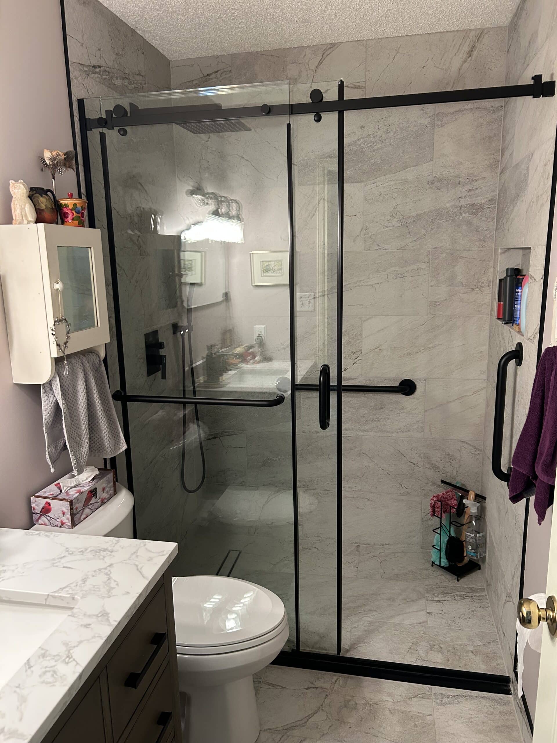 walk in shower in newly renovated bathroom