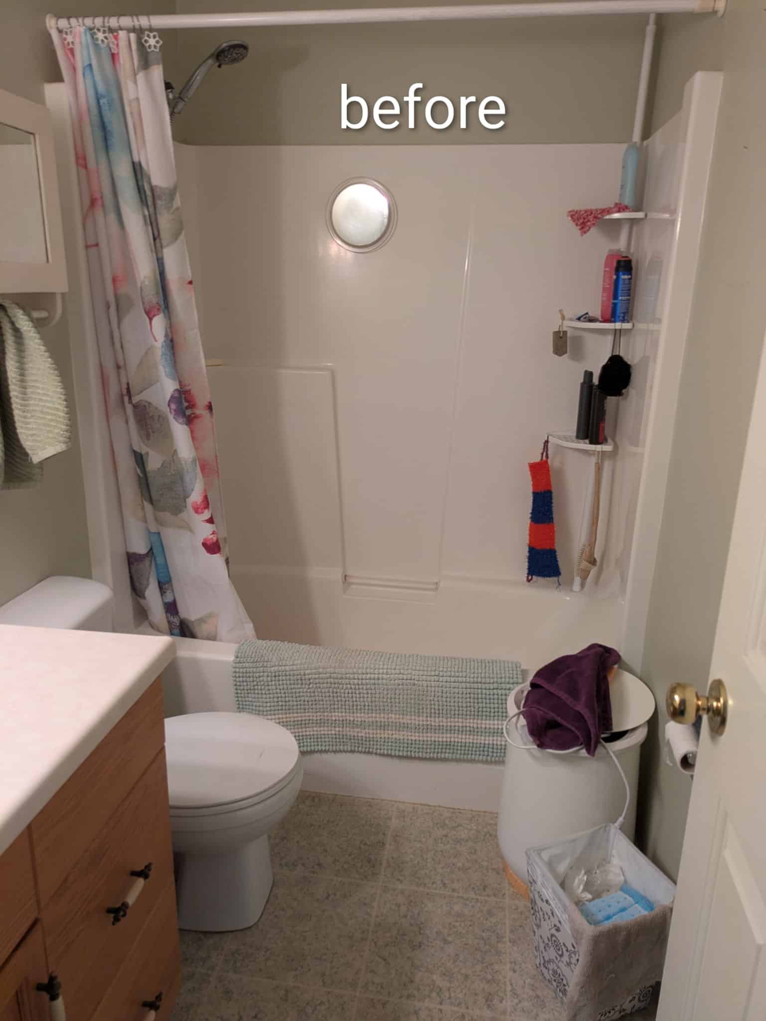 Before image of bathroom with old bathtub