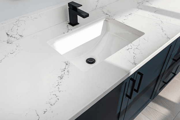 sink with quartz countertop in renovated bathroom
